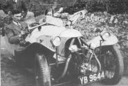 A dashing young gent with his lady takes his Morgan/Anzani for a spin.